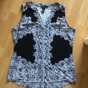 Sleeveless top with silver zippers